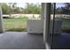 Covered patio includes stub-outs for utilities and view of green space at 2438 Sw 165Th Street Rd, Ocala, FL 34473