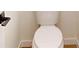 Close-up of a toilet in a neutral-colored bathroom with modern fixtures at 2438 Sw 165Th Street Rd, Ocala, FL 34473