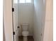 This toilet room provides essential functionality with a standard toilet and fixtures for a simple yet practical space at 2438 Sw 165Th Street Rd, Ocala, FL 34473