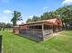 Large barn features a metal roof, wood construction, and a pasture at 2540 Ne 120Th St, Anthony, FL 32617