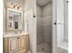 Bathroom featuring vanity, mirror, and walk-in shower with bench at 2540 Ne 120Th St, Anthony, FL 32617