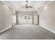 Spacious bedroom with carpet, recessed lighting, and doors leading to outdoor at 2540 Ne 120Th St, Anthony, FL 32617