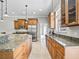 Well-equipped kitchen with ample cabinet space, granite counters, stainless steel appliances, and a functional layout at 2540 Ne 120Th St, Anthony, FL 32617