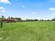 Expansive property features a barn, pastures, fencing, and mature trees at 2540 Ne 120Th St, Anthony, FL 32617