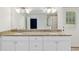 Bathroom featuring double sink vanity with granite countertops at 4010 Sw 7Th Avenue Rd, Ocala, FL 34471