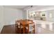 A casual dining room includes a wood table and seating for four and opens to the kitchen at 4010 Sw 7Th Avenue Rd, Ocala, FL 34471