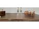 Casual dining area features hardwood floors, access to the back yard, and natural light at 4010 Sw 7Th Avenue Rd, Ocala, FL 34471