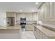 Well-equipped kitchen featuring stainless steel appliances, granite counters and a center island at 4010 Sw 7Th Avenue Rd, Ocala, FL 34471