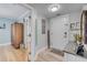 Inviting condo entryway with modern decor, wood floors, and storage at 420 Bouchelle Dr # 204, New Smyrna Beach, FL 32169