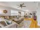 Spacious living area combines a sectional sofa and dining space, perfect for entertaining and relaxed living at 420 Bouchelle Dr # 204, New Smyrna Beach, FL 32169