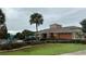 Clubhouse exterior view near community pool with well-maintained landscaping at 4412 Sw 49Th Ave, Ocala, FL 34474