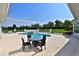 Backyard patio featuring an outdoor dining area and a view of the sparkling pool and spa at 601 Se 80Th St, Ocala, FL 34480
