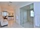 Bright bathroom features a glass enclosed shower, sleek counters and seating at 601 Se 80Th St, Ocala, FL 34480