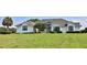 Charming single-story home with a well-manicured lawn and mature landscaping at 601 Se 80Th St, Ocala, FL 34480