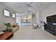 Bright and airy living room view into kitchen and fireplace and sleek white ceilings at 601 Se 80Th St, Ocala, FL 34480