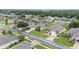 Aerial view showcasing a neighborhood with well-maintained homes and green spaces at 6651 Sw 93Rd Ct, Ocala, FL 34481