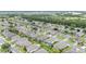 Expansive aerial photograph of a housing development with diverse home styles and well-kept yards at 6651 Sw 93Rd Ct, Ocala, FL 34481