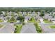 Scenic aerial view of a residential neighborhood featuring well-maintained homes and lush landscaping at 6651 Sw 93Rd Ct, Ocala, FL 34481