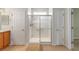 Bathroom with glass-enclosed shower and tiled floor at 6651 Sw 93Rd Ct, Ocala, FL 34481