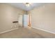 A spacious bedroom with carpet and ceiling fan offers a blank canvas at 6651 Sw 93Rd Ct, Ocala, FL 34481