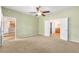 Spacious bedroom showing entrance to en-suite bath and kitchen at 6651 Sw 93Rd Ct, Ocala, FL 34481
