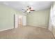 Large bedroom featuring a ceiling fan and a view of the Primary bath at 6651 Sw 93Rd Ct, Ocala, FL 34481
