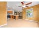 Open concept living space with kitchen featuring stainless steel appliances and tile flooring at 6651 Sw 93Rd Ct, Ocala, FL 34481