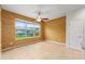 Neutral room with natural light streaming through a window at 6651 Sw 93Rd Ct, Ocala, FL 34481