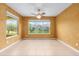 Bright room with natural light, neutral paint, and tile flooring at 6651 Sw 93Rd Ct, Ocala, FL 34481