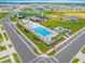 Community features a pool, splashpad, playground, a sports court, and green spaces for community enjoyment at 7641 Sw 63Rd Lane Road, Ocala, FL 34474