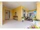 Comfortable front porch furnished with chairs and a small table, perfect for enjoying the outdoors at 7641 Sw 63Rd Lane Road, Ocala, FL 34474