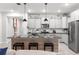 Modern kitchen with sleek countertops, stainless steel appliances, and a spacious island for dining at 7641 Sw 63Rd Lane Road, Ocala, FL 34474