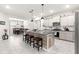 Stylish kitchen with granite countertops, stainless steel appliances, and an island with bar seating at 7641 Sw 63Rd Lane Road, Ocala, FL 34474