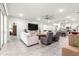 Open-concept living room with seamless flow to kitchen for a combined living space great for gatherings at 7641 Sw 63Rd Lane Road, Ocala, FL 34474