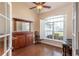Bright dining room features a wet bar with wood floors and a large window at 8170 Sw 56Th Avenue Rd, Ocala, FL 34476