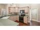 The kitchen features updated countertops, appliances, and plenty of storage space at 8170 Sw 56Th Avenue Rd, Ocala, FL 34476