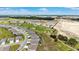Aerial view showcasing the residential community, golf course, and surrounding landscape at 8606 Sw 61St Loop, Ocala, FL 34481