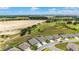 Aerial shot highlighting a planned community adjacent to a golf course under development, showcasing future potential at 8606 Sw 61St Loop, Ocala, FL 34481