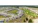 Aerial view of the neighborhood and community golf course at 8606 Sw 61St Loop, Ocala, FL 34481