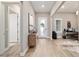 Open foyer with wood-look tile flooring and natural light at 8606 Sw 61St Loop, Ocala, FL 34481