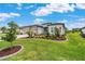 Charming single-story home with stone accents, landscaped garden beds and well-kept lawn at 8606 Sw 61St Loop, Ocala, FL 34481