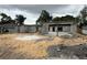 Exterior view of a house under construction showing concrete block walls, sand, and the framework of the structure at 8664 Se 162Nd St, Summerfield, FL 34491