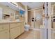 Bathroom featuring a shower, vanity, and tiled floor at 8784 Sw 93Rd Ln # A, Ocala, FL 34481