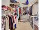 Walk-in closet with ample shelving and hanging storage for clothing and accessories at 8784 Sw 93Rd Ln # A, Ocala, FL 34481