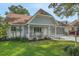 Charming single-story home featuring a welcoming front porch, attached garage, and well-maintained landscaping at 8784 Sw 93Rd Ln # A, Ocala, FL 34481
