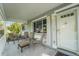 Cozy front porch with seating, offering a welcoming space to relax and enjoy the outdoors at 8784 Sw 93Rd Ln # A, Ocala, FL 34481