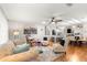 Bright living room featuring stylish decor, natural light, and wood-look flooring at 8874 Sw 95Th St # E, Ocala, FL 34481