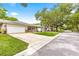 Charming homes along a quiet street with lush landscaping and well-maintained lawns at 8874 Sw 95Th St # E, Ocala, FL 34481