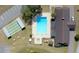 Aerial view of community pool, hot tub, shuffleboard, and clubhouse with ample parking at 8901 Sw 103Rd Ln, Ocala, FL 34481