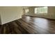 Cozy living room with modern flooring, filled with natural light at 8901 Sw 103Rd Ln, Ocala, FL 34481
